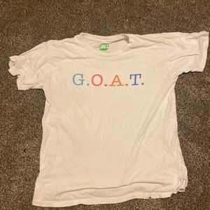 Kids L G.O.A.T white shirt.